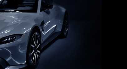 Front,Headlights,Of,Supercar,On,Black,Background,copy,Space